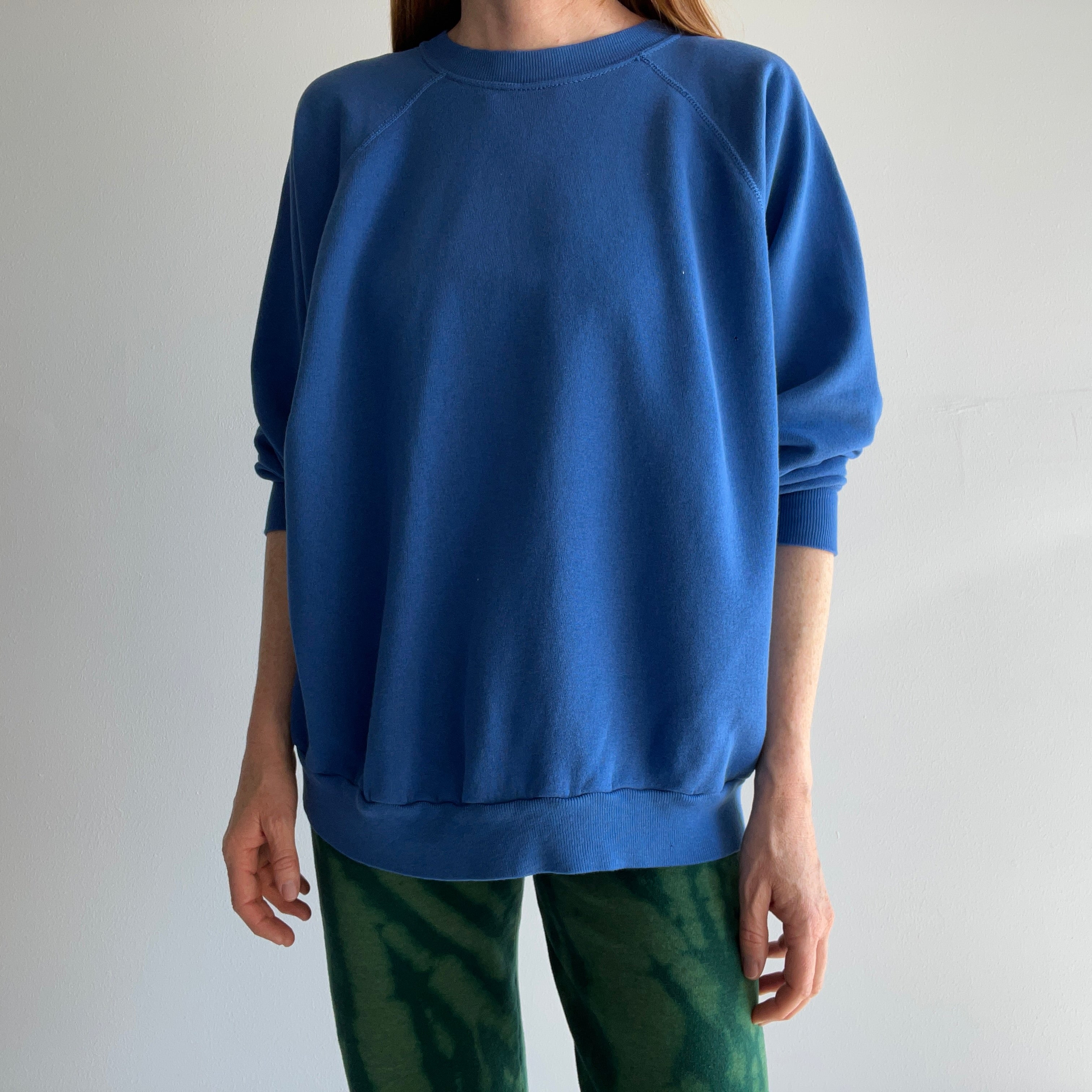 1980s Thinned Out and Slouchy Blue Raglan Sweatshirt