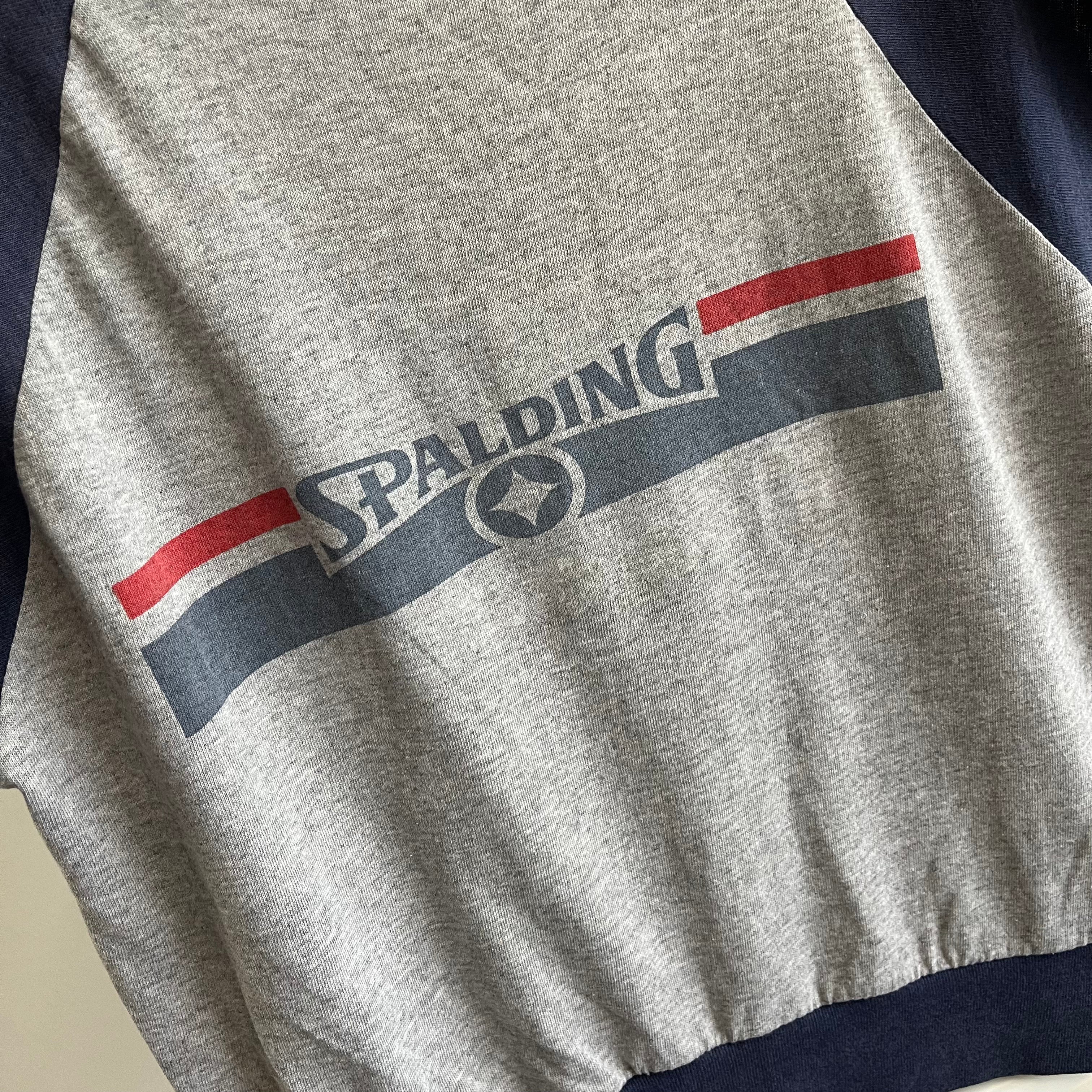 Échauffement musculaire style t-shirt à manches courtes Spaulding des années 1980