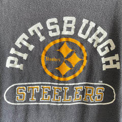 1970s Champion Blue Bar Brand Pittsburg Steelers T-shirt en coton délavé de plus petite taille