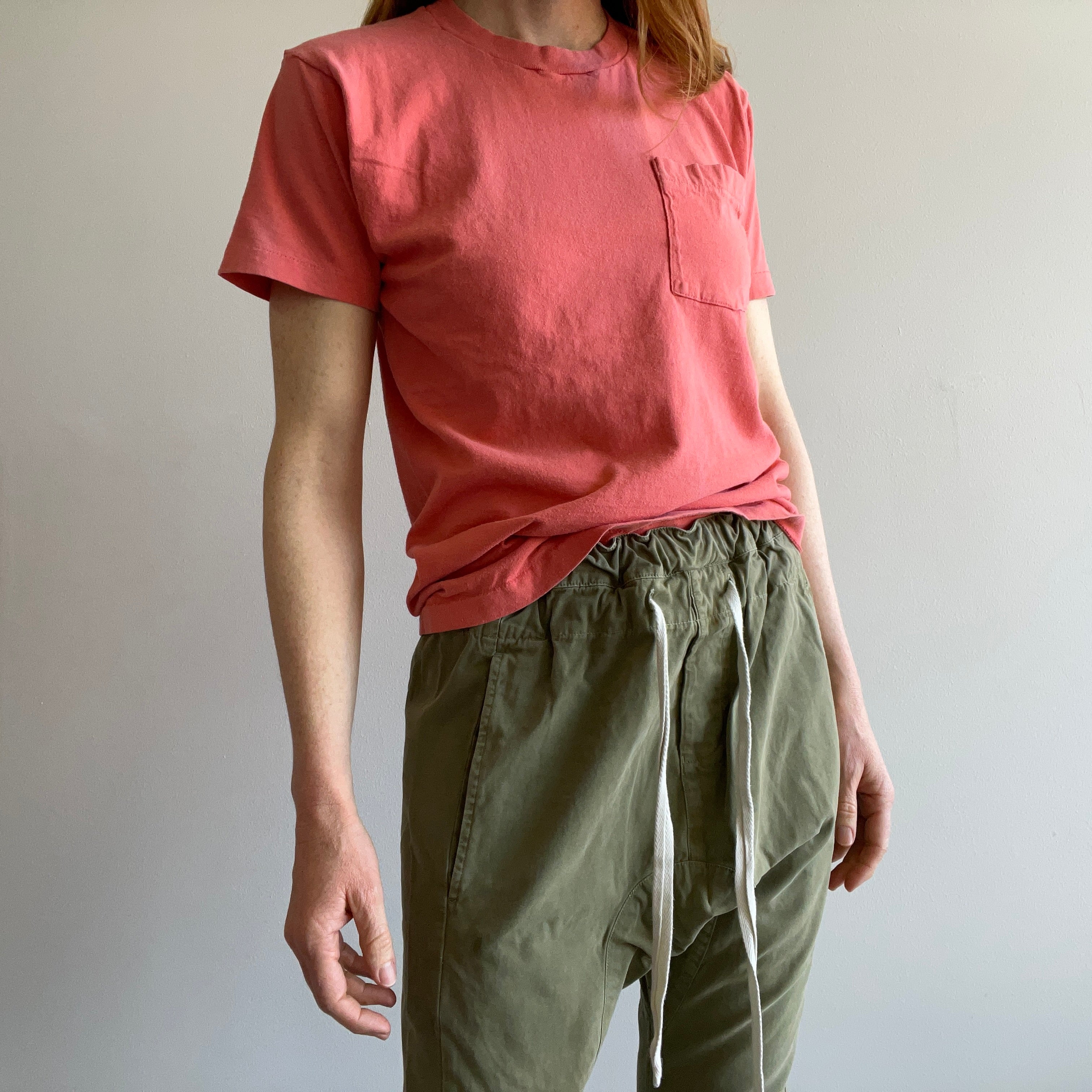 1980s faded salmon pink/orange pocket t-shirt