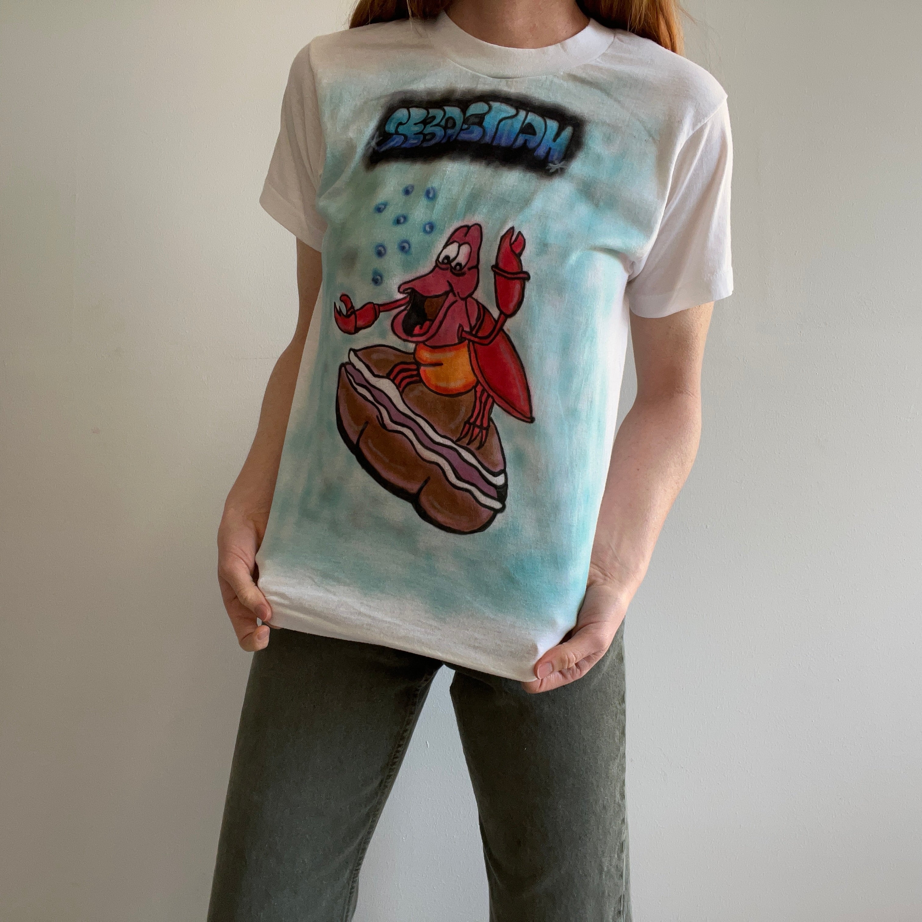 1989 Little Mermaid Sebastian Airbrush T-shirt sur un écran étoiles