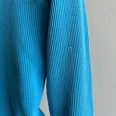 Henley en tricot gaufré thermique bleu sarcelle des années 1980 avec coudes usés
