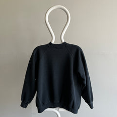 1980s Blank Faded Black Raglan with a Complementary Oil Stain