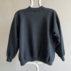 1980s Blank Faded Black Raglan with a Complementary Oil Stain