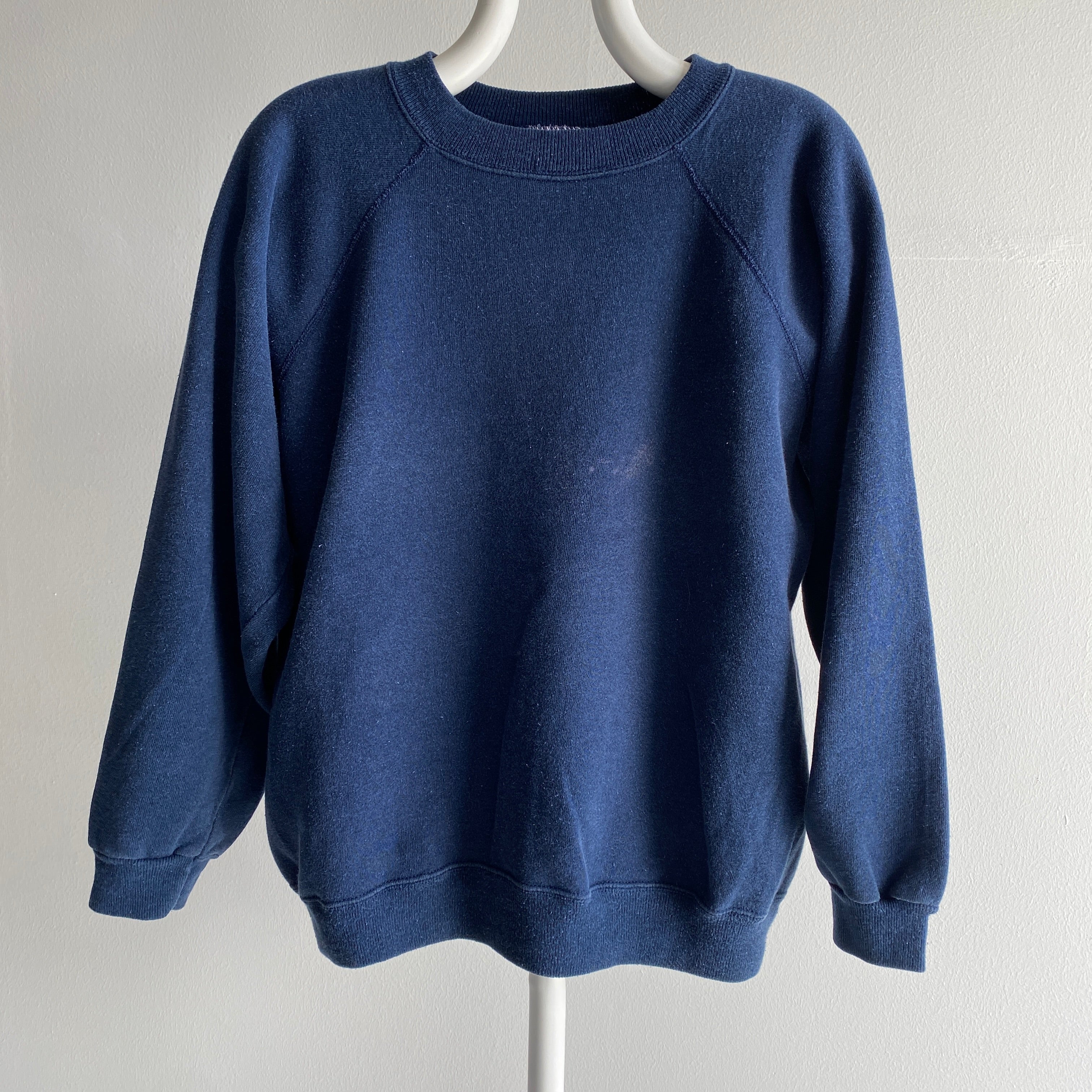 1990s Great Faded Blank Navy Raglan by Hanes with Bleach Splotches