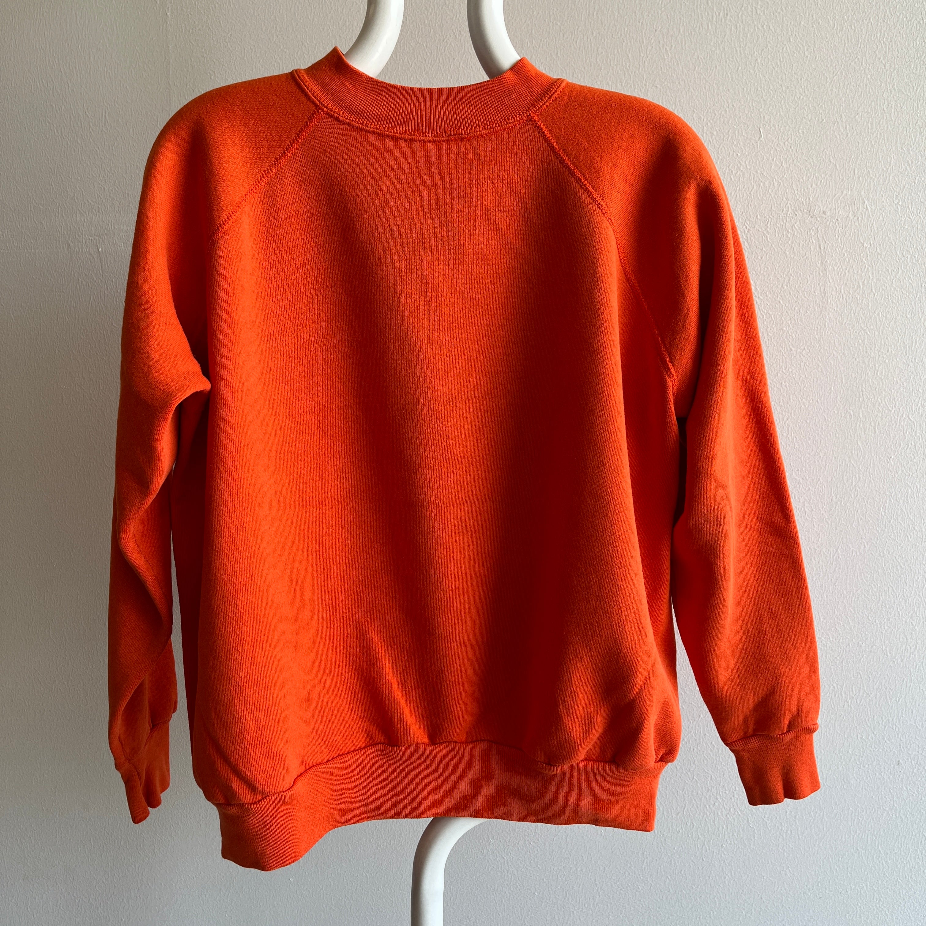 Sweat-shirt raglan orange vierge des années 1980