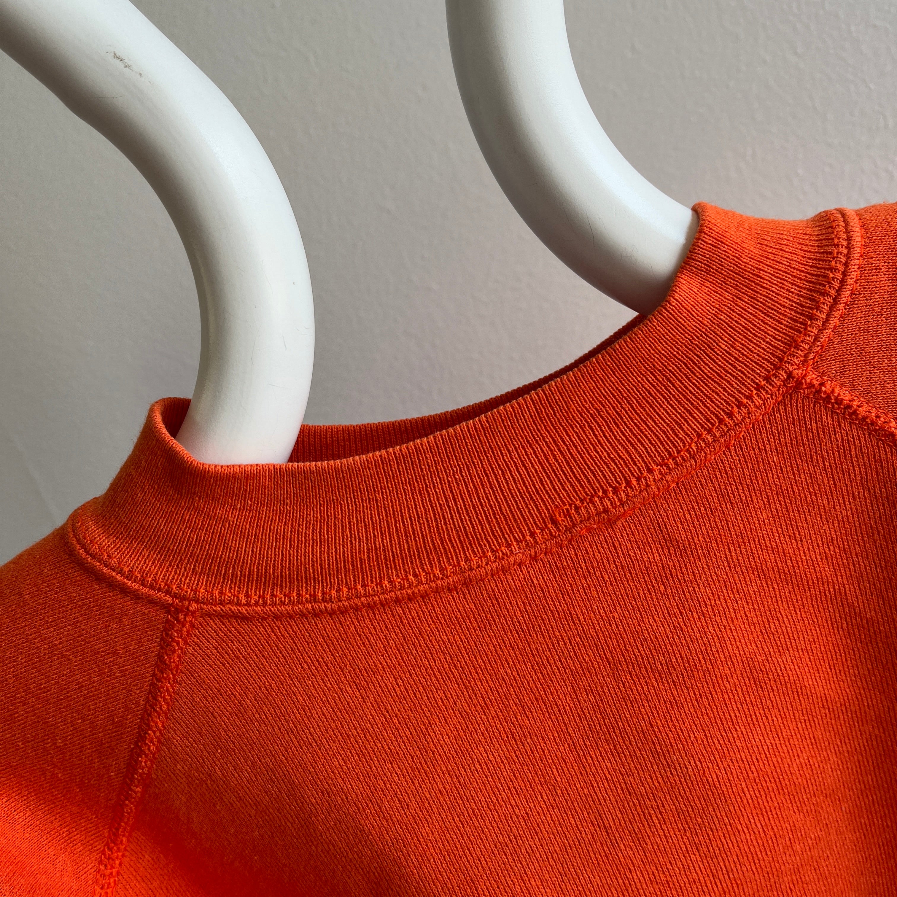 Sweat-shirt raglan orange vierge des années 1980