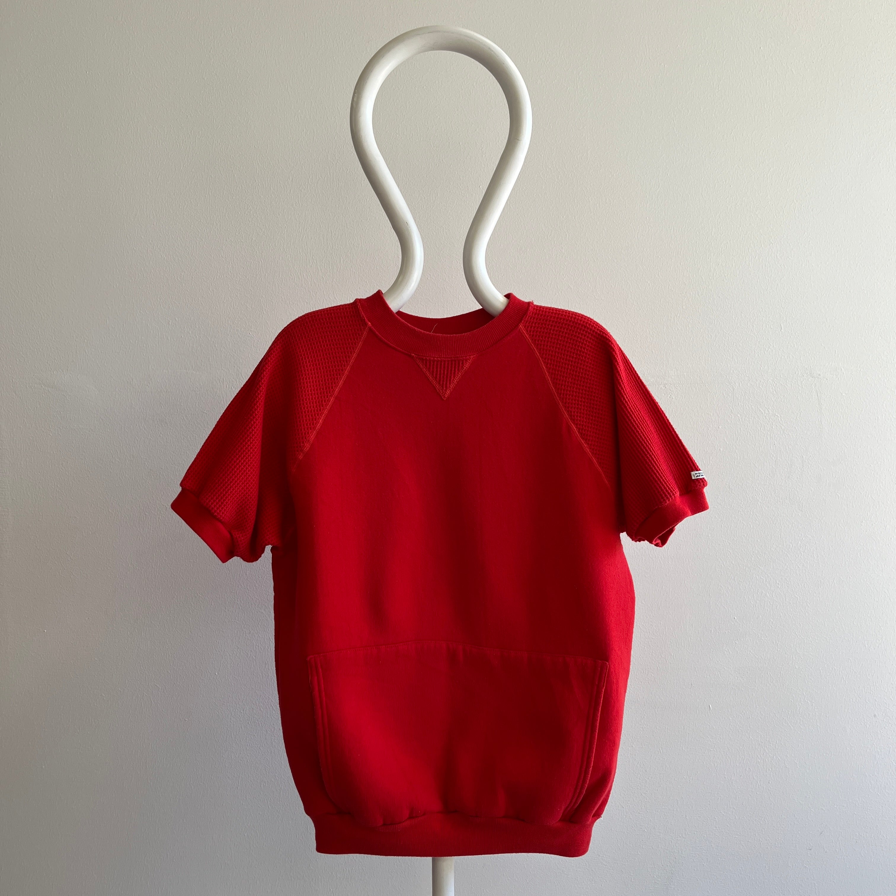 1980s EPIC BLANK RED WARM UP WITH WAFFLE SLEEVES AND A POUCH BY RUSSELL