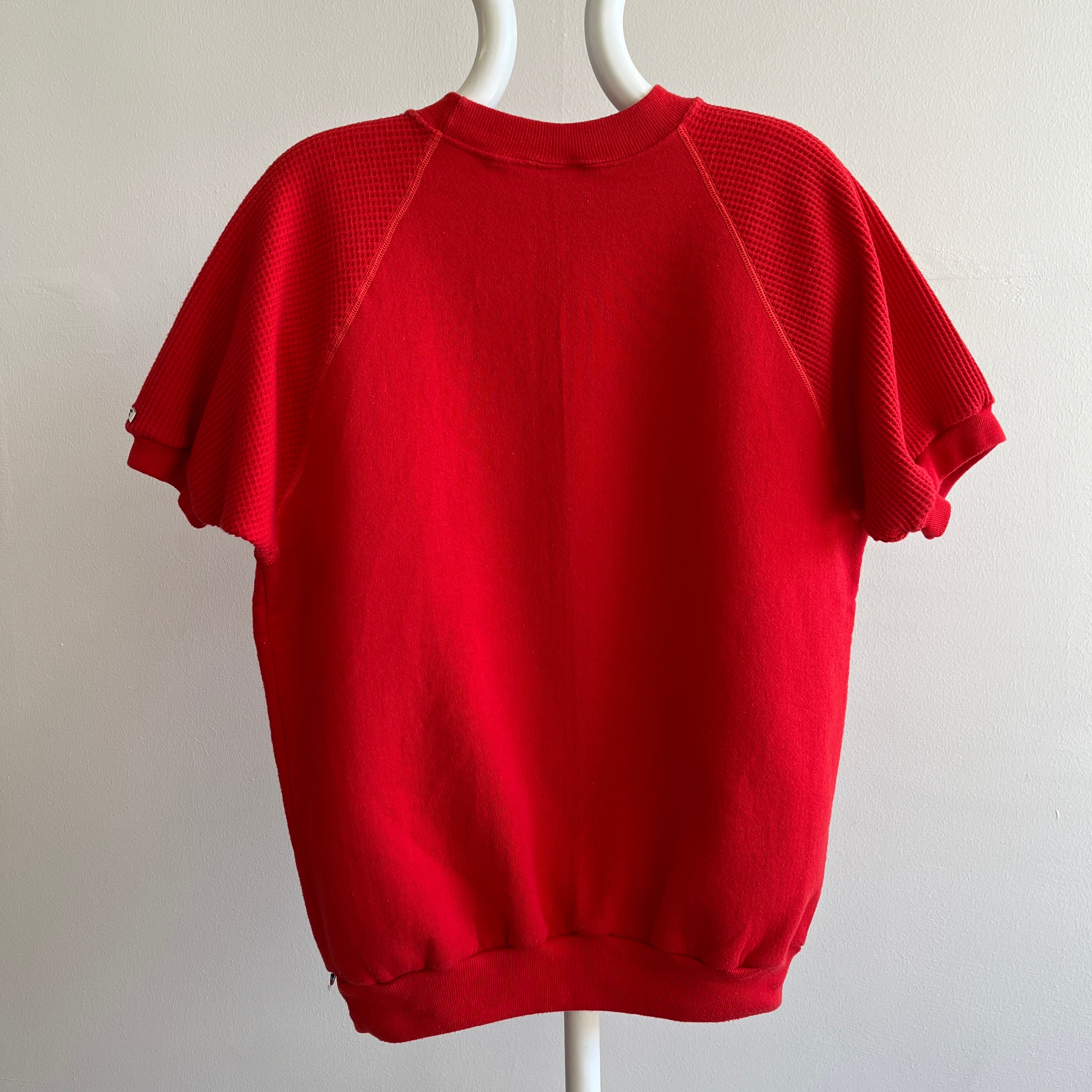 1980s EPIC BLANK RED WARM UP WITH WAFFLE SLEEVES AND A POUCH BY RUSSELL