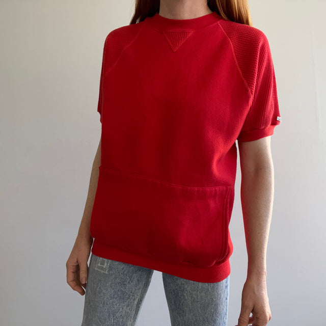 1980s EPIC BLANK RED WARM UP WITH WAFFLE SLEEVES AND A POUCH BY RUSSELL