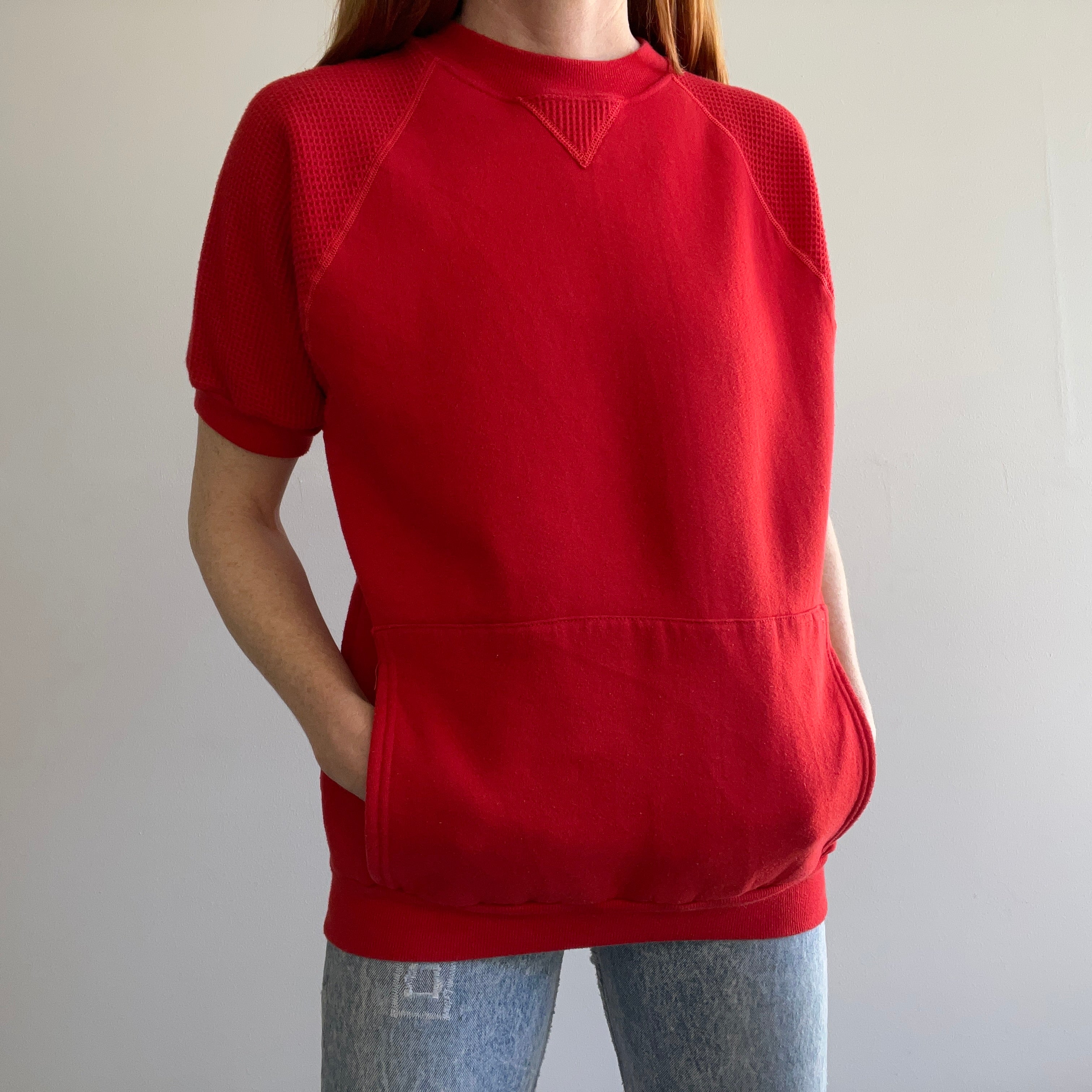 1980s EPIC BLANK RED WARM UP WITH WAFFLE SLEEVES AND A POUCH BY RUSSELL