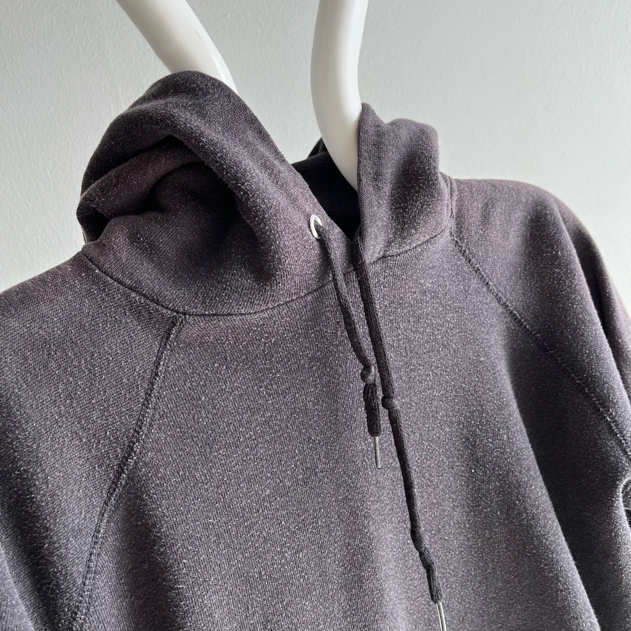 1980s Sun Faded Black Tultex Hoodie with Mending