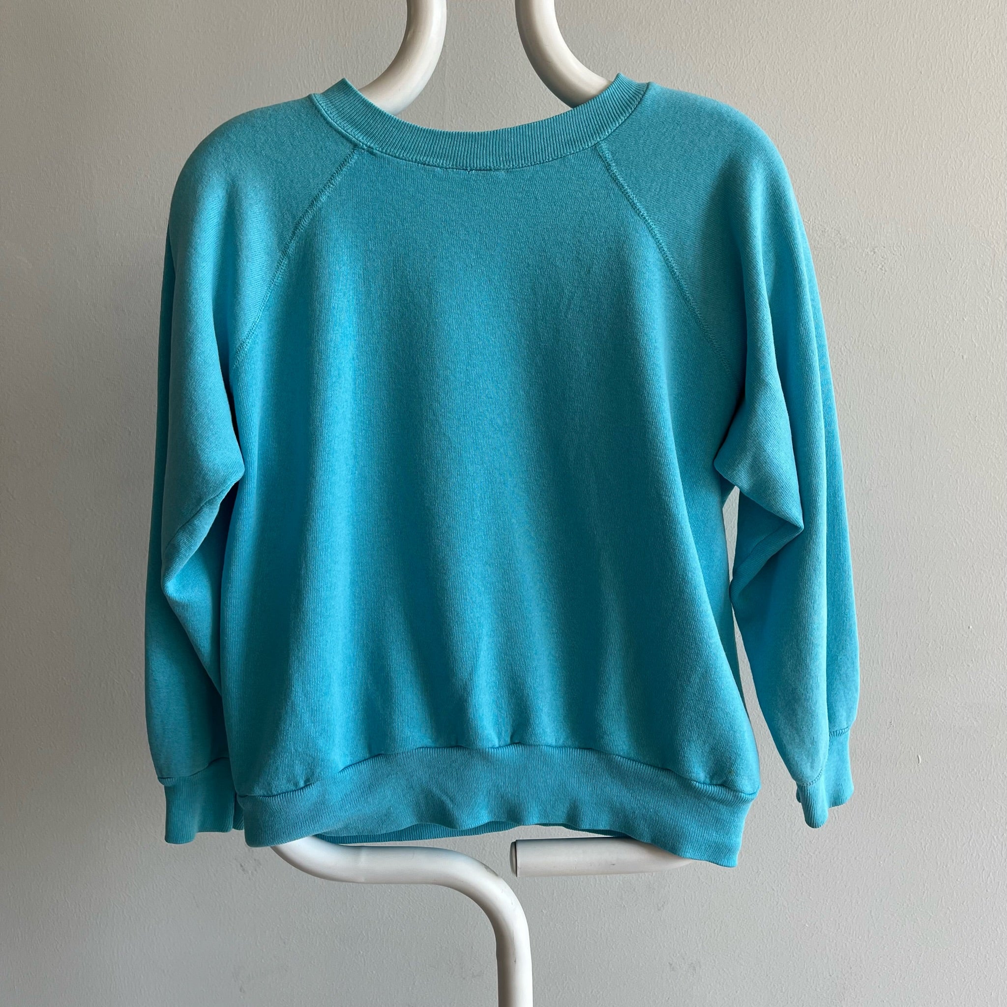 Raglan bleu écume de mer teinté/vert des années 1980