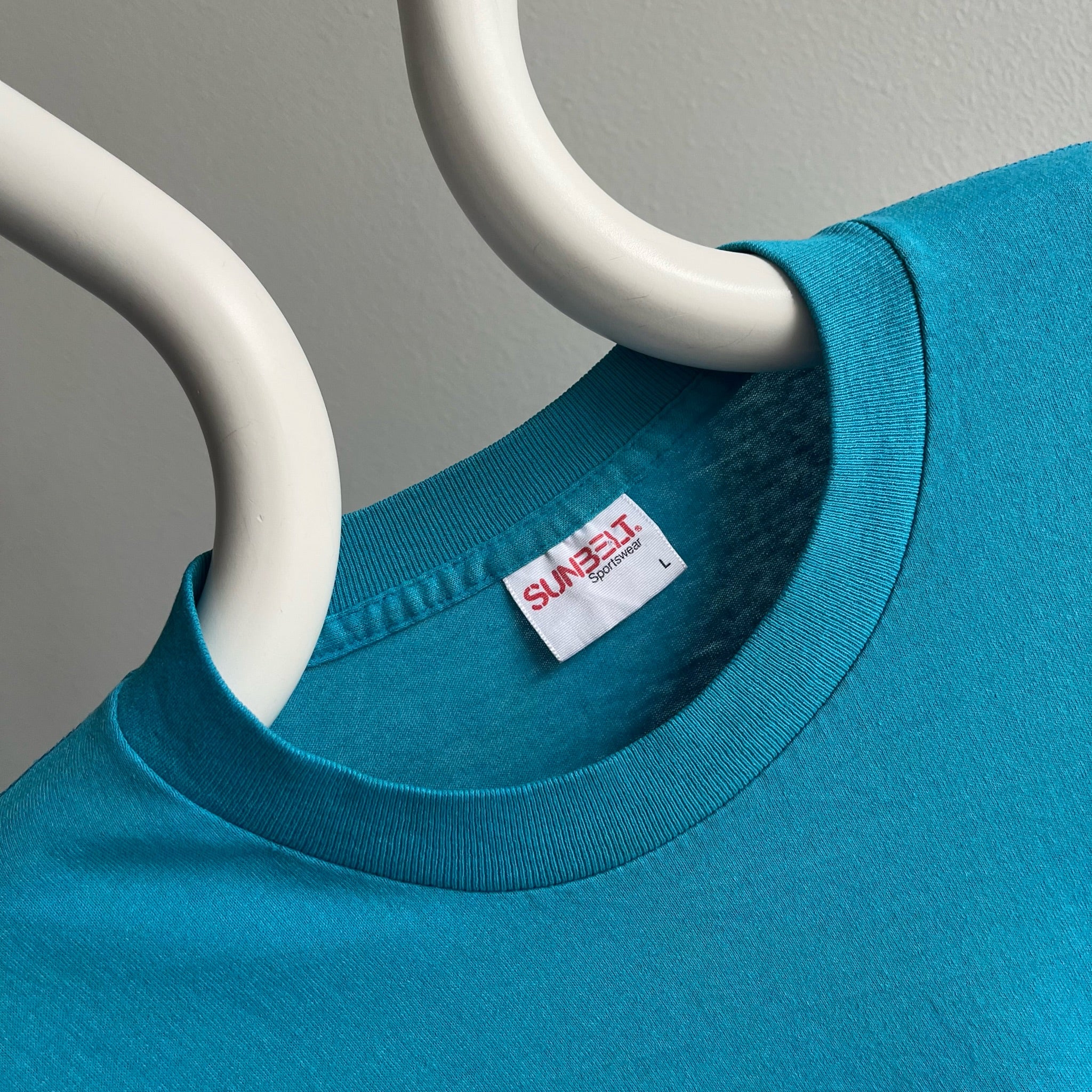 T-shirt bleu sarcelle à manches longues Thin + Slouchy Sunbelt des années 1980